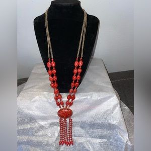 Drapers and Damon's long amber necklace